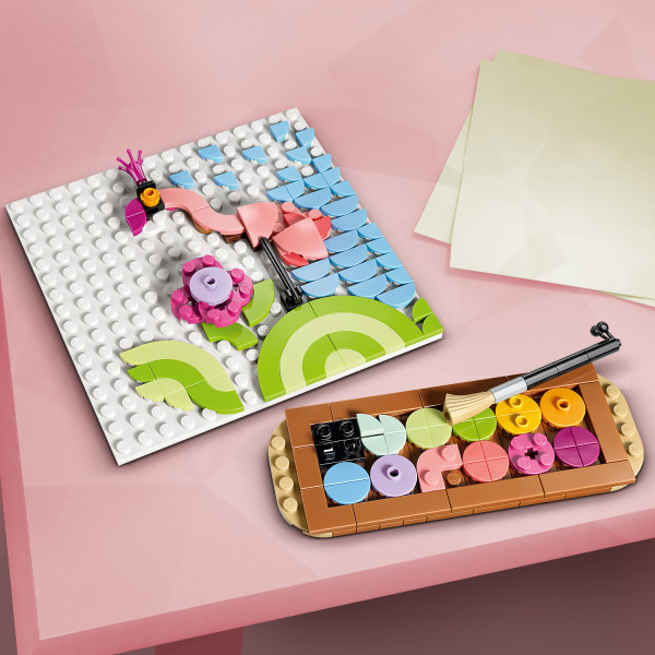 Model comes with paint palette and brush.
