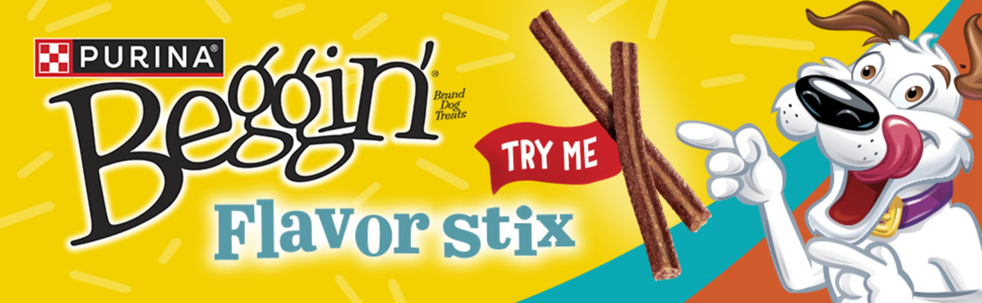 Hamlet the dog licks his lips while looking at Beggin’ Strips and Stix treats.