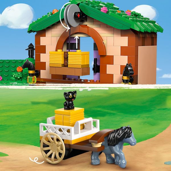 Use the elevator and pony cart to transport the hay bales.