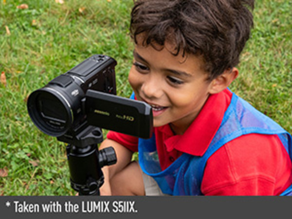 Boy using the Panasonic HC-900k at the park