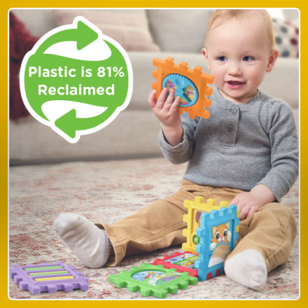 Kid builds and plays with the 6-in-1 Snap & Learn Busy Cube.
