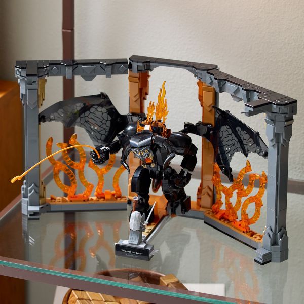 Pose the Balrog’s limbs and wings for a dynamic display.