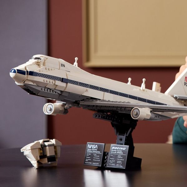 Features a sleek fuselage with a shuttle mounting system.