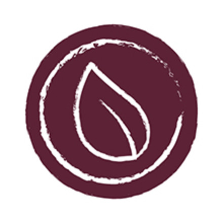 Circular icon with leaf signifying natural