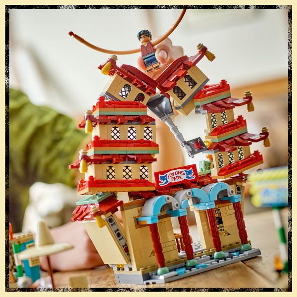 A firm tap on the top brings the pagoda crashing down.