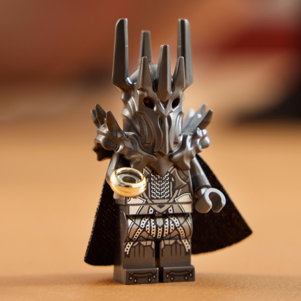 Includes a Sauron minifigure holding The One Ring.
