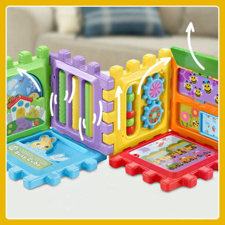 Busy cube shown in a wall build pattern. Arrows illustrate motor skill movement and activities.