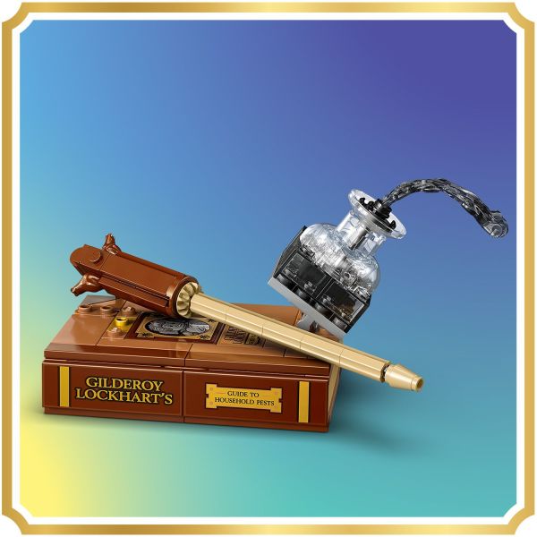 Gilderoy Lockhart’s wand, book and a mid-spill ink bottle.