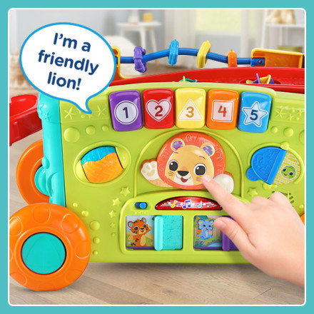 Kid pushes lion on the side panel. Wagon says: I’m a friendly lion!