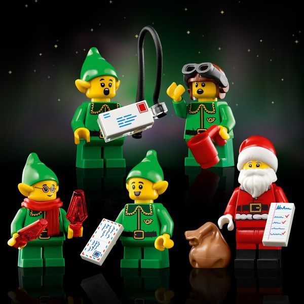 Includes a Santa minifigure and 4 elf figures.