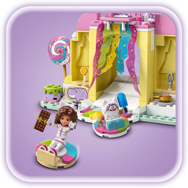 Slide through the colorful waterfall riding on donut floats.