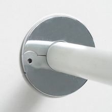 Escutcheon plate installed to cover wall connection
