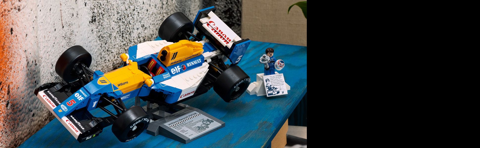 Craft a replica of the iconic F1 race car that propelled Nigel Mansell to victory in the 1992 Formula 1 World Championship.