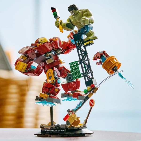 The scene includes collapsing structures and traffic lights.