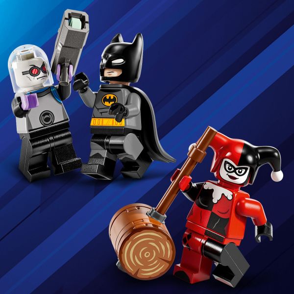 A hammer, stud launcher and a molded cape for Batman .