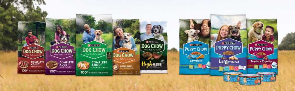 The entire lineup of Dog Chow and Puppy Chow formulas is displayed in an outdoor setting.