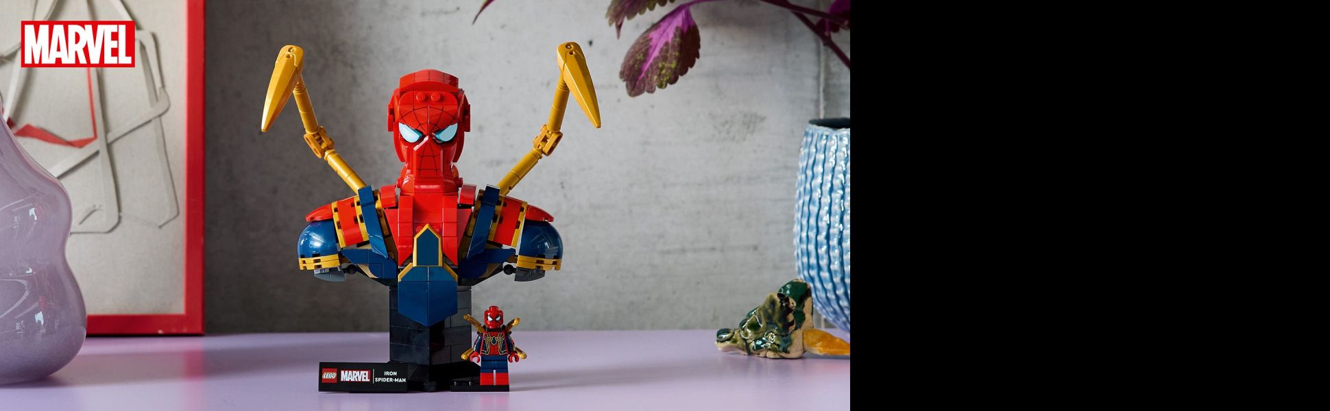The build-and-display model features a rotatable head, fully jointed arms and a LEGO Iron Spider-Man minifigure.