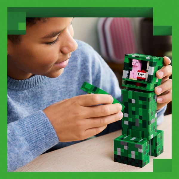 The front of the head detaches to reveal hidden TNT.