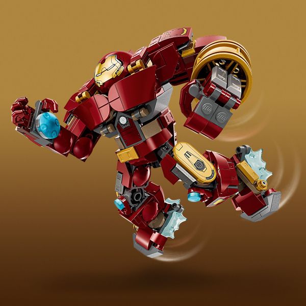 Iron Man crashes through the debris in his Hulkbuster armor.