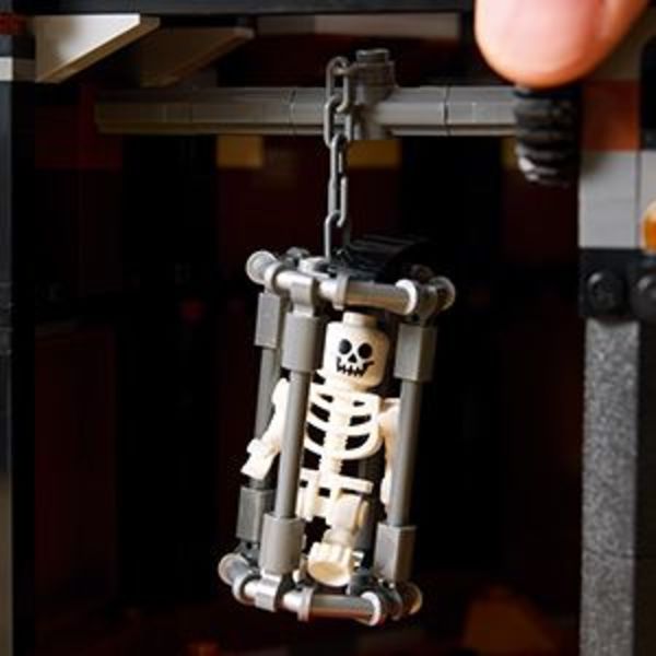 Rotate a dial to raise the prison’s orc cage.