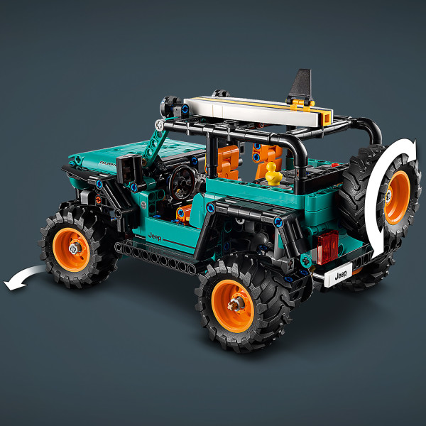 Use the spare tire to steer the car model.