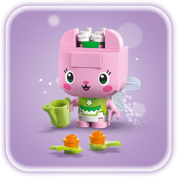 Kitty Fairy has a watering can.
