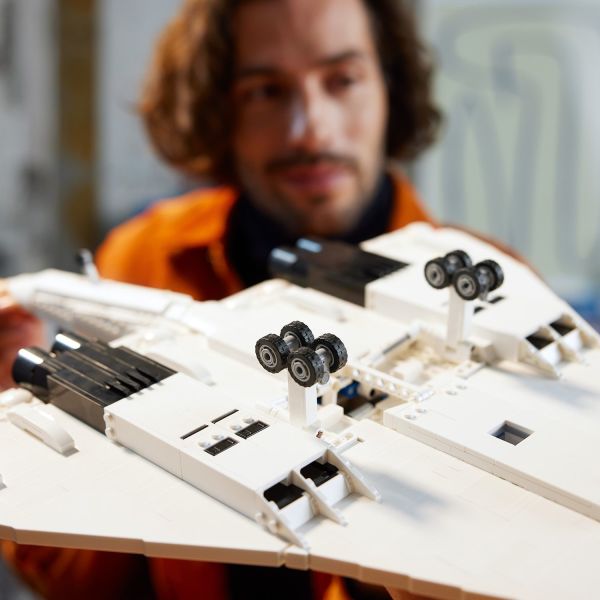 Lower the landing gear and tail bumper wheel.