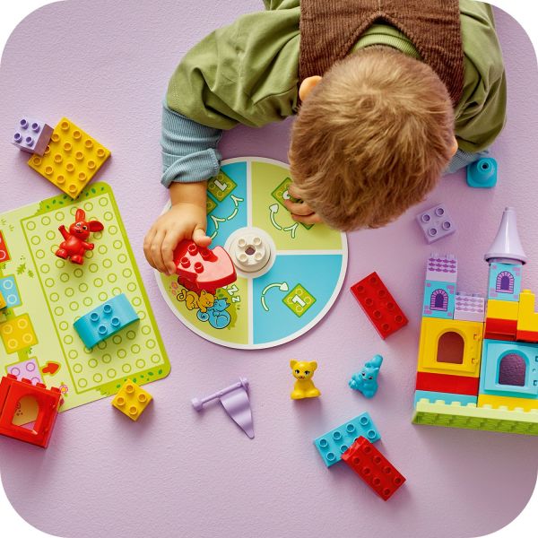 Toddlers choose the brick the spinner points to.