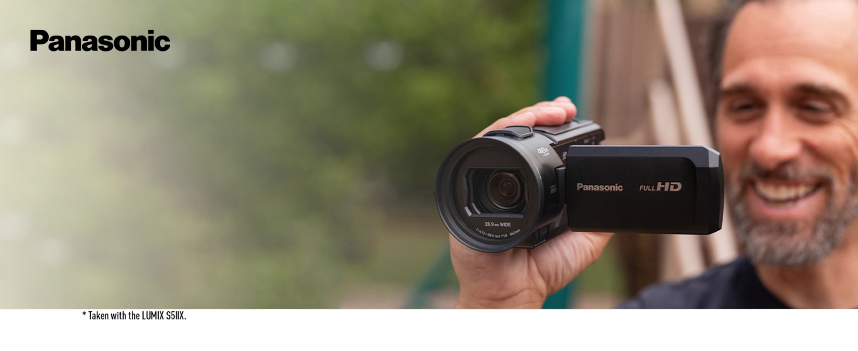 Man using the HC-V900 to capture family moments