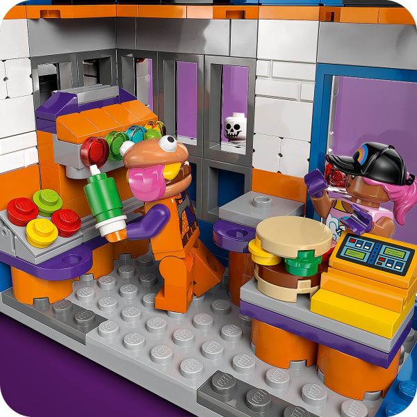 Decorate the build with furniture, a cash register and more.