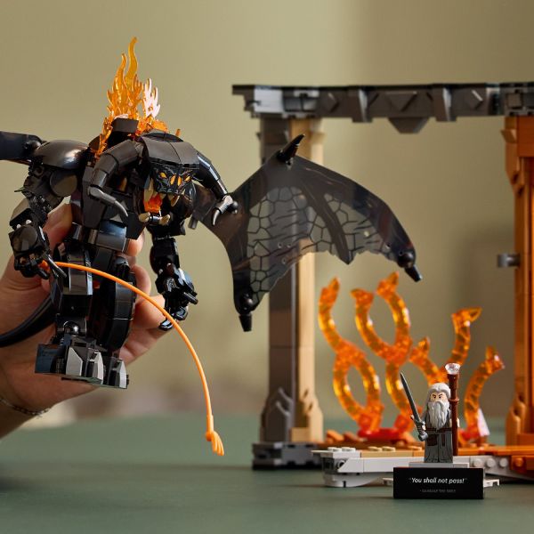 Includes Gandalf’s staff and sword and the Balrog’s whip.
