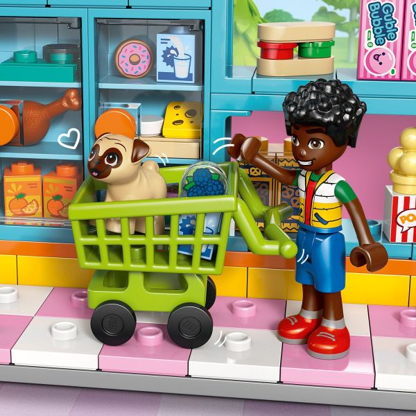 Choose groceries from the shelves and put them in the cart.