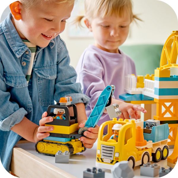 Little fingers can make the cement mixer’s barrel spin.