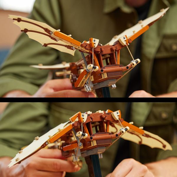 Driven by a visible interplay of string, hinges and pulleys.