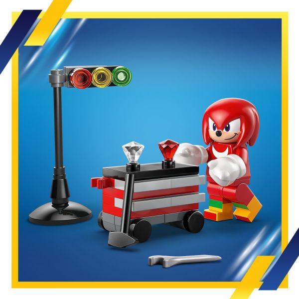Starting lights, 2 Chaos Emeralds and a toolbox with tools.