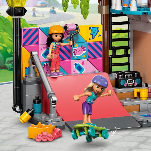 The friends practice their skills on the skate ramp.