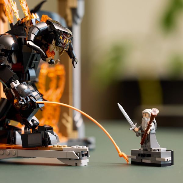 Gandalf the Grey faces the Balrog in a fearless stance.