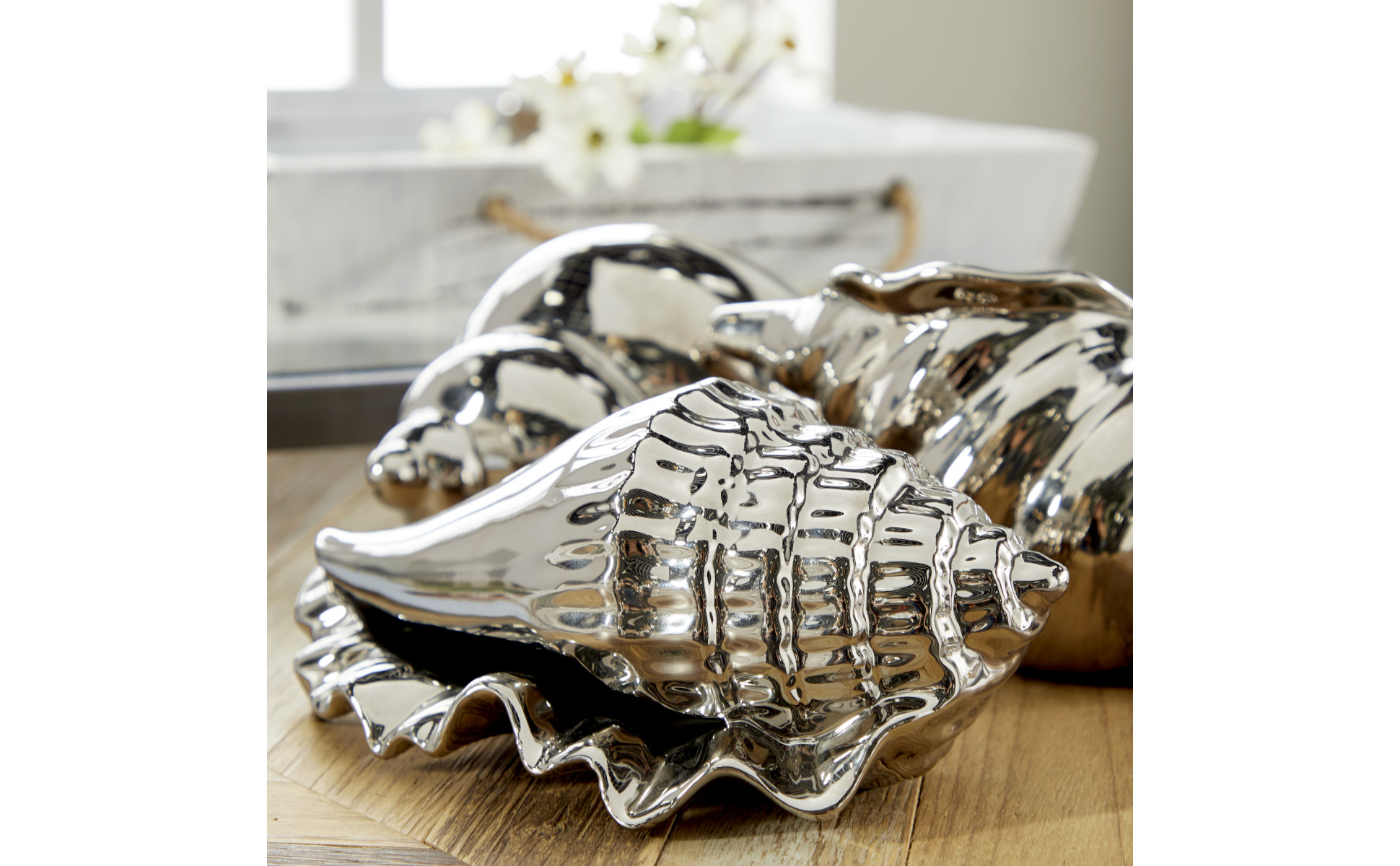 Litton Lane Silver Ceramic Shell Shell Sculpture (Set of 3