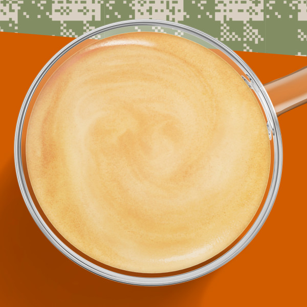 A close-up of a cup of coffee with cream viewed from above.