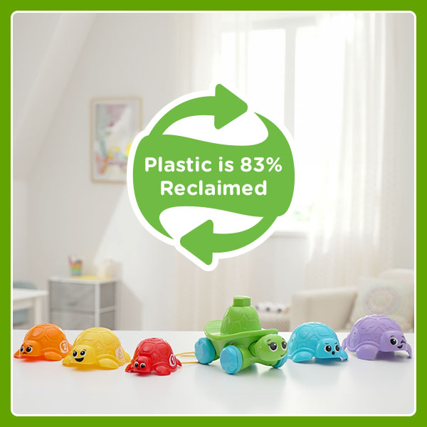 Plastic is 83% Reclaimed. Turtles shown fanned out on a table.