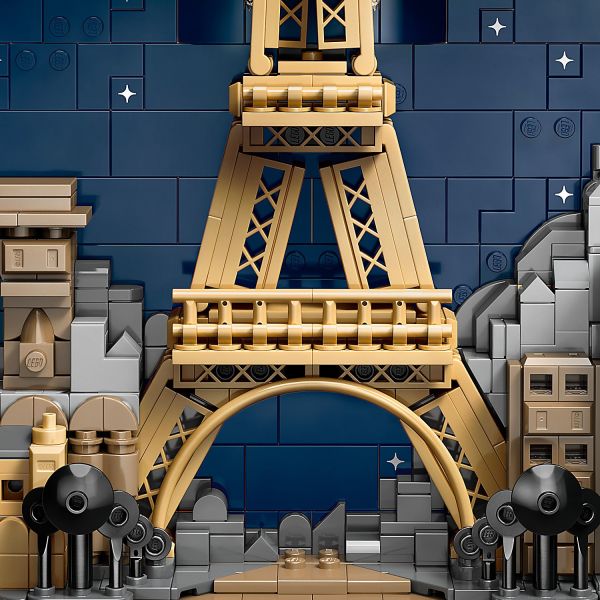 Create a starry night sky and cityscape as you build.