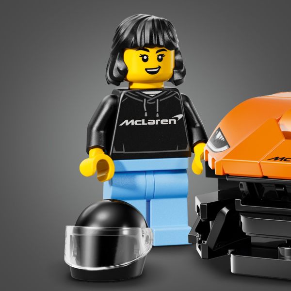Race car set includes driver minifigure in a McLaren outfit.