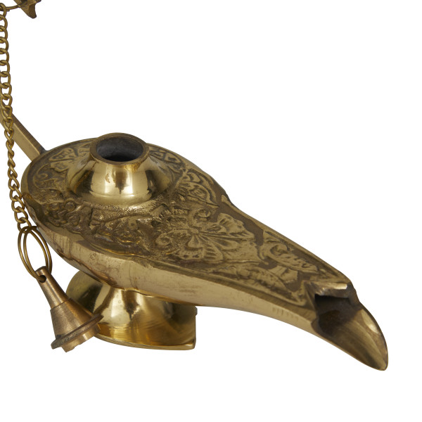 Aladdin ornate brass oil genie lamp with handle on a round