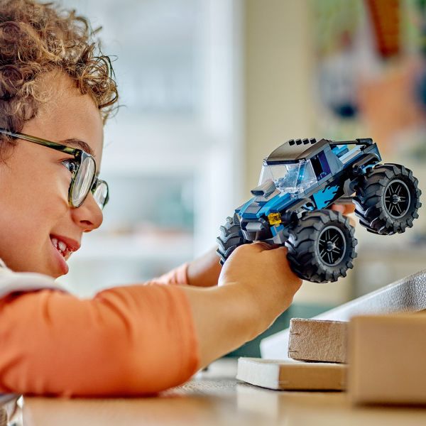 Includes a monster truck driver for imaginative role play.