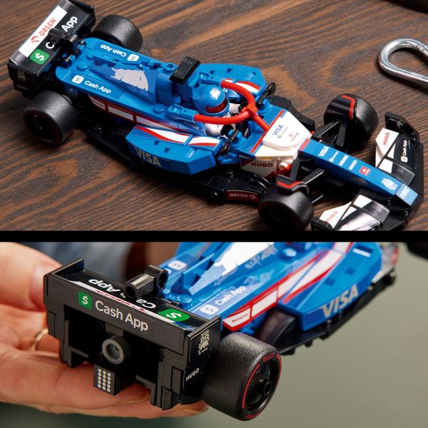Race car includes team-sponsor logos and a rear wing.