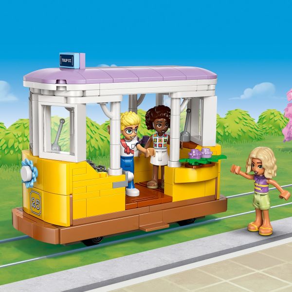 The friends love taking a ride on the cozy streetcar.