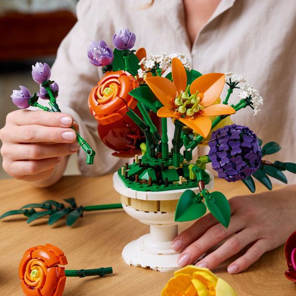 Rearrange the flower heads to create a custom display.