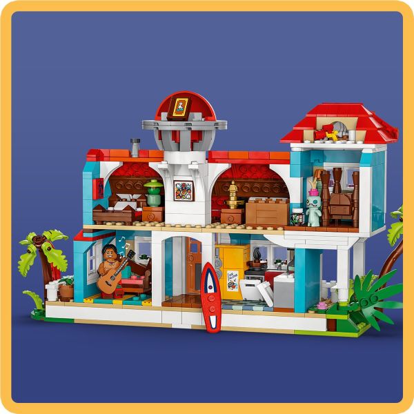 Building set has 6 rooms and a rooftop area for play.