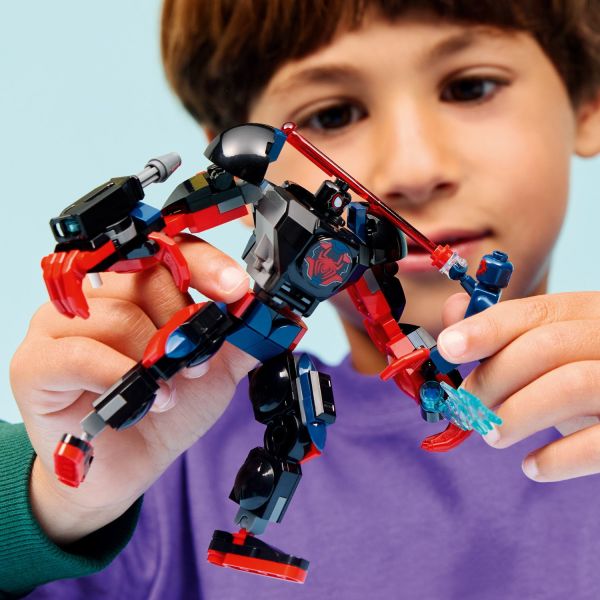 Spider-Man 2099 strikes with a hand-held laser beam.