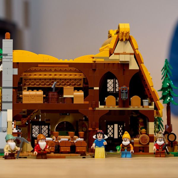 The cottage opens to display and allow access to its rooms.